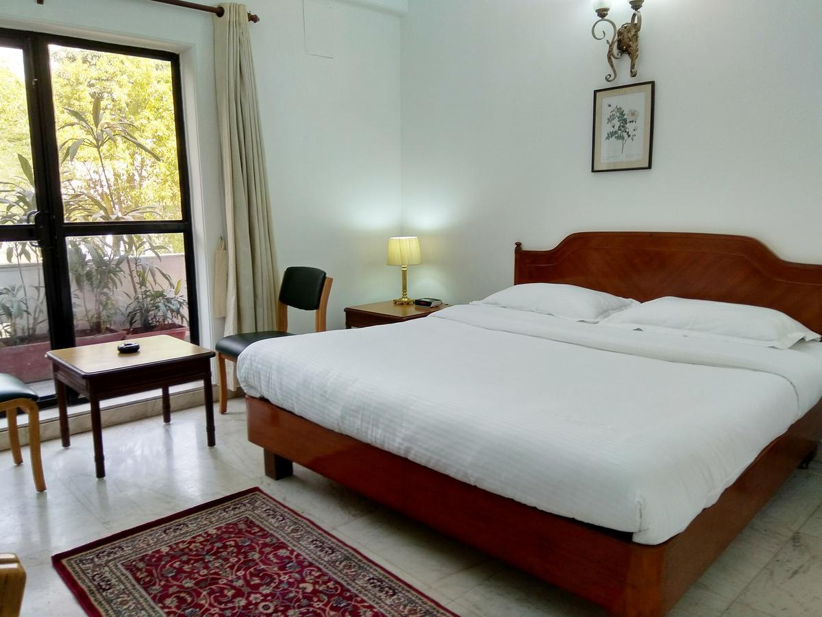 Hotel Palm Greens Új-Delhi Kültér fotó