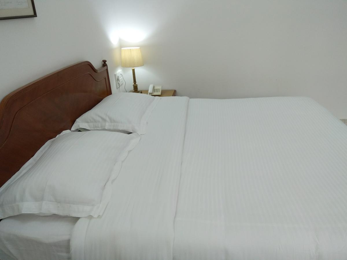 Hotel Palm Greens Új-Delhi Kültér fotó